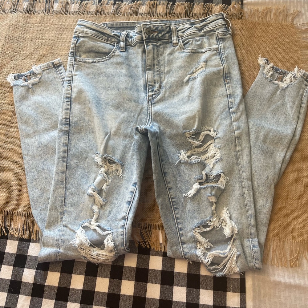 Americans Eagle Ne(x)t level stretch light wash destructed jeans. Size 12 long.